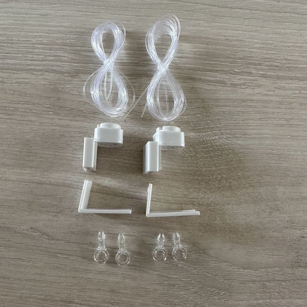 Комплект боковой фиксации рулонной шторы