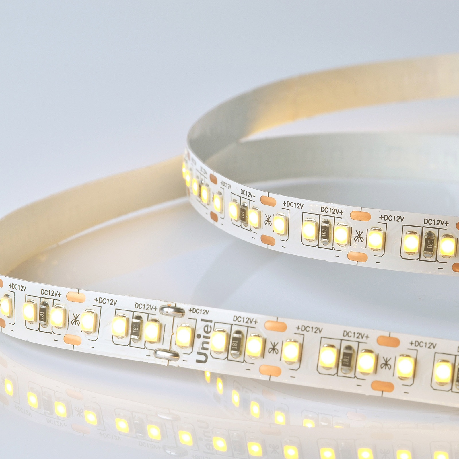 Лента светодиодная тёплый белый 14W/m 168LED/m12V ULS-M14-2835-168LED/m-10mm-IP20-DC12V-14W/m-5M-3000K PROFI