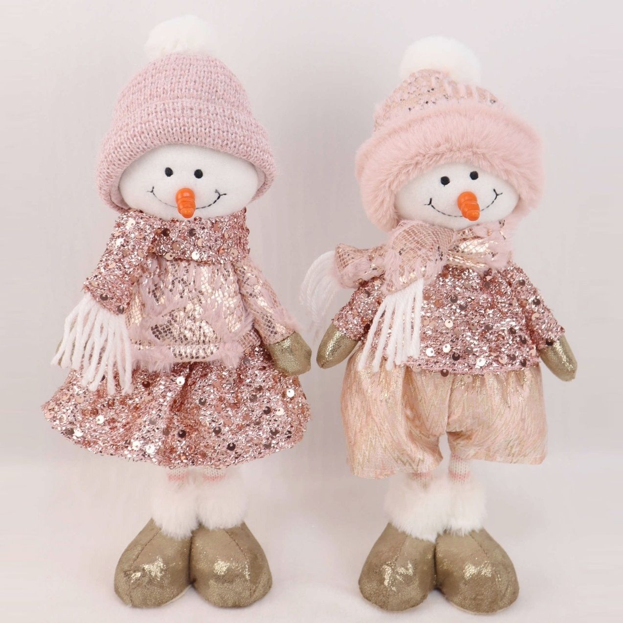 Изделие декоративное Снеговик мальчик стоящий 13x12x35 см розовый