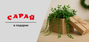 Подарочная коробка из крафт-картона с искусственными ампельными растениями внутри, на деревянном фоне, минималистичный стиль, без текста и людей